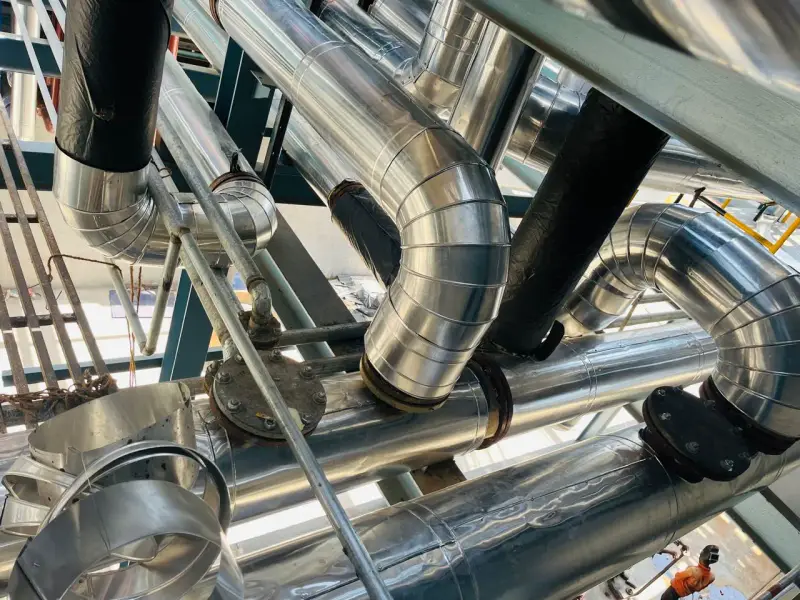 Insulated process pipework within an industrial installation